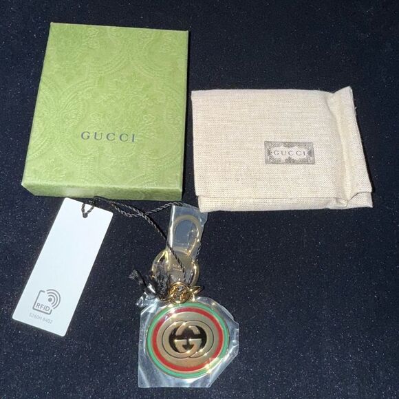 Brand new with box and dustbag Gucci Gold and Green Keychain